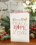 Religious Christmas greeting card with gold foil accents featuring a peaceful holiday scene, by UK Greetings.