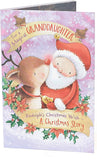 Rudolph and Santa storybook Christmas greeting card for granddaughter by UK Greetings with festive holiday illustrations.
