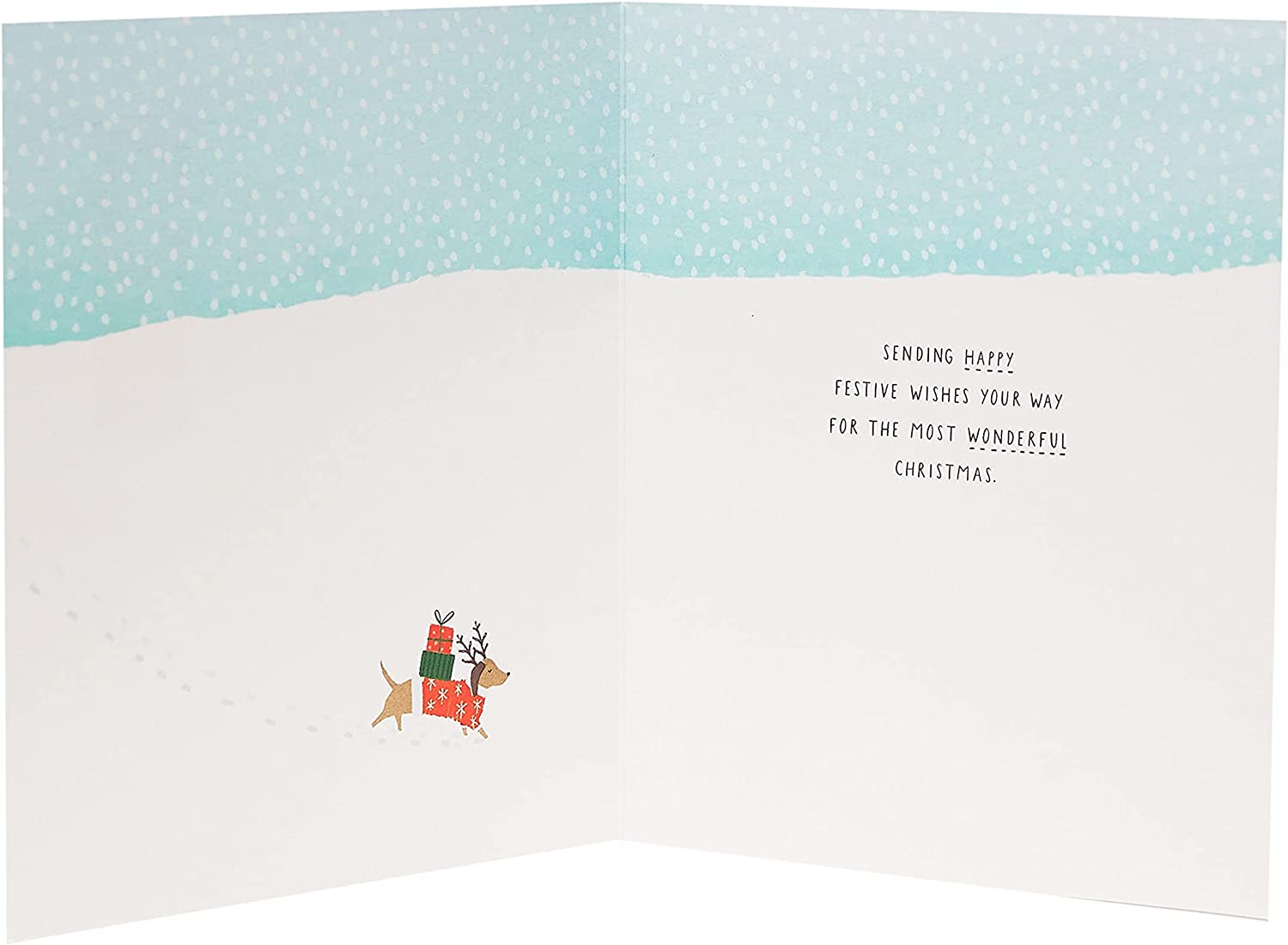 Festive Christmas greeting card featuring snow dogs across the miles, from UK Greetings, with holiday-themed snowy landscape and dogs.