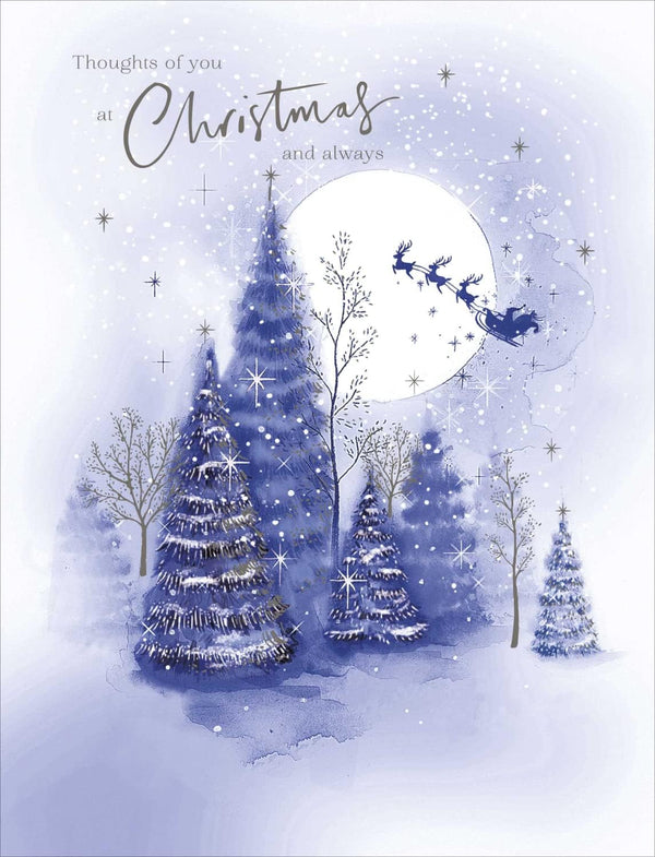 Snowy scene Christmas greeting card from UK Greetings with "With Thoughts of You" message, featuring festive winter imagery.