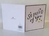 UK Greetings congratulation greeting card with "So Proud of You" message, featuring colorful floral design and celebratory theme.