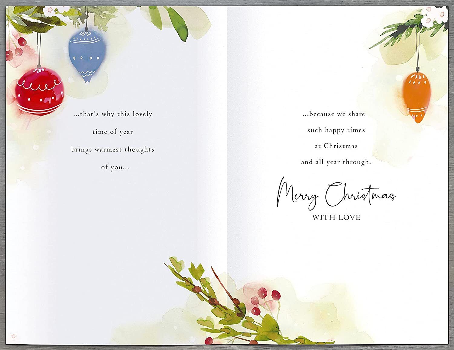 Festive greeting card featuring a heartfelt Christmas design with foiled accents from UK Greetings.
