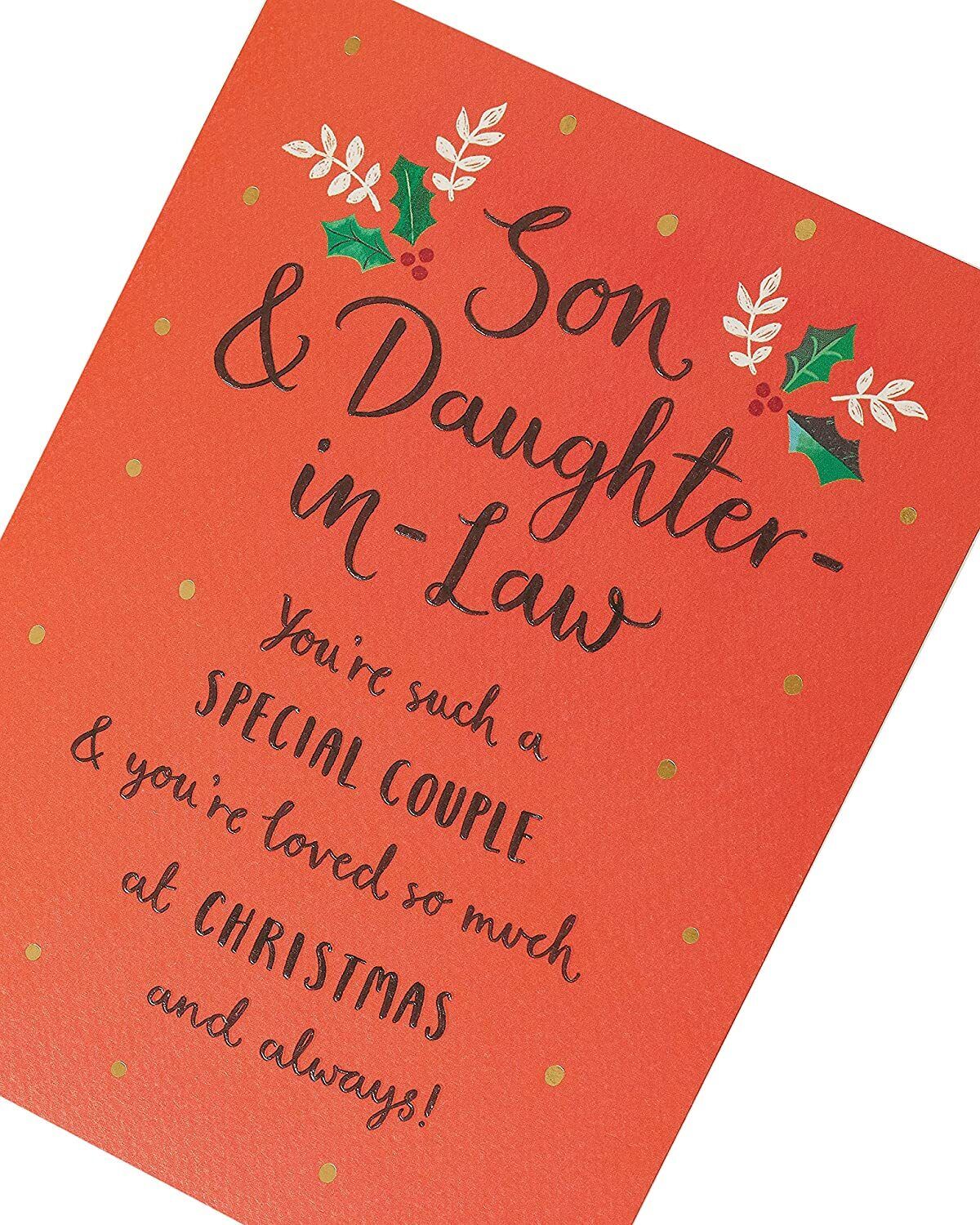 Son and Daughter-in-Law Christmas greeting card with festive typography design from UK Greetings showing holiday message and decorative elements.