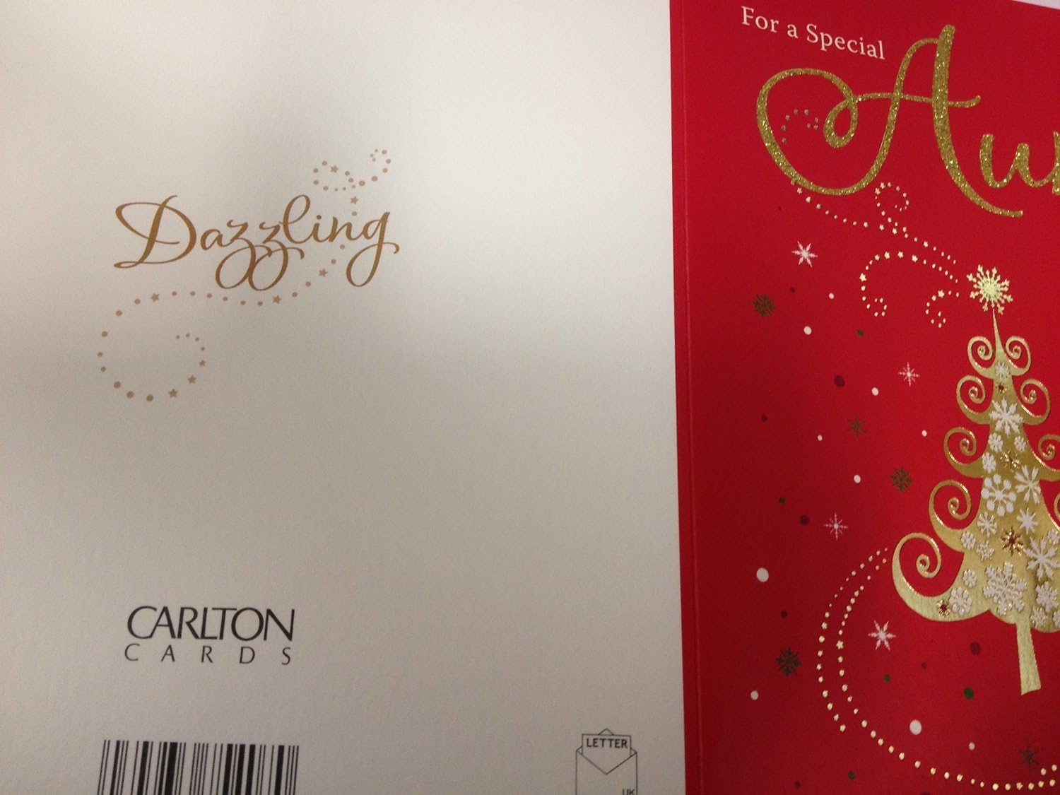 A festive Christmas greeting card from UK Greetings with heartfelt holiday wishes and a colorful holiday design.