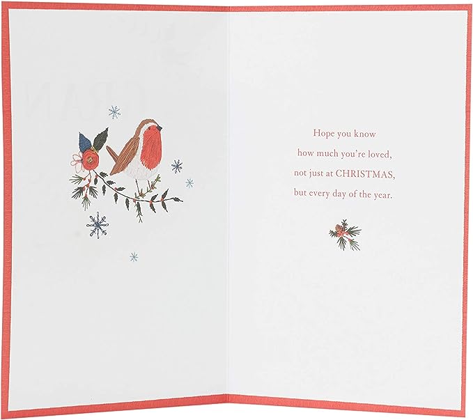 Hand-finished Christmas greeting card with floral embroidery design by UK Greetings, featuring intricate embroidery on high-quality paper.