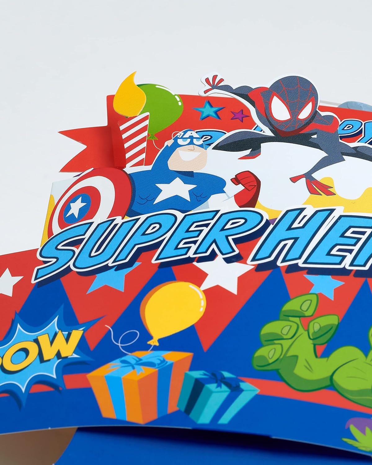 Spiderman 3D cake pop-up birthday greeting card from UK Greetings featuring a colorful Spiderman character design.