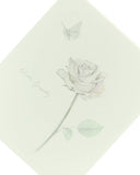 Sympathy greeting card with elegant floral design, UK Greetings brand, showcasing a heartfelt floral illustration on the front.
