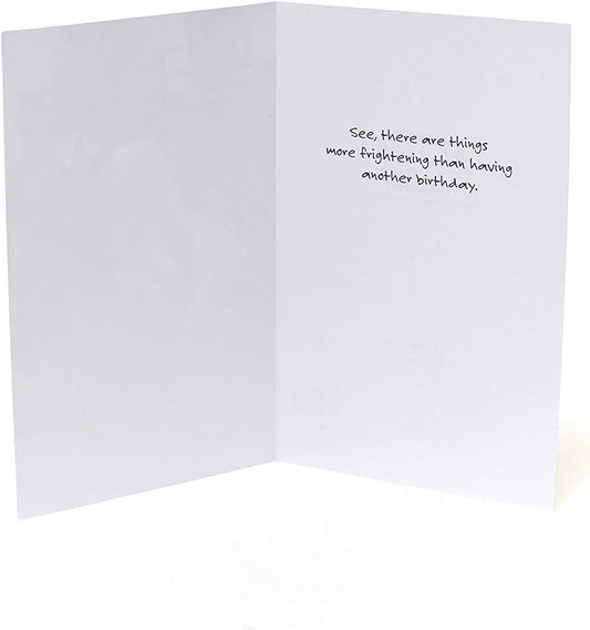 Funny birthday greeting card from UK Greetings featuring scary humor and spooky illustrations perfect for humorous celebrations