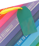 Vibrant rainbow large gift bag with colorful greeting card design, UK Greetings branding, suitable for festive celebrations.