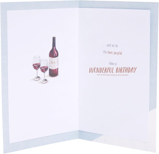 Greeting card featuring a watch and wine design for birthdays, UK Greetings' colorful and festive greeting card image.
