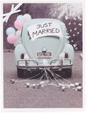 Contemporary wedding greeting card for couples with "Just Married" design, from UK Greetings, featuring elegant photographic artwork.