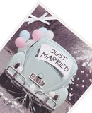 Contemporary wedding greeting card for couples with "Just Married" text, featuring elegant floral design and romantic imagery.