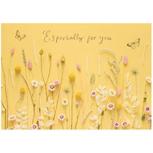 UKG birthday greeting card for her featuring a warm floral photographic design with vibrant flowers and elegant details.