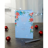Elegant Christmas greeting card for friends by UKG featuring a floral design with copper foil accents.
