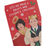 Christmas greeting card for him, her, or friend featuring Nessa and Bryn design by UKG, with festive holiday imagery.