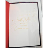 UKG Christmas greeting card for friends featuring festive drinks and gold foil accents, with colorful holiday design.