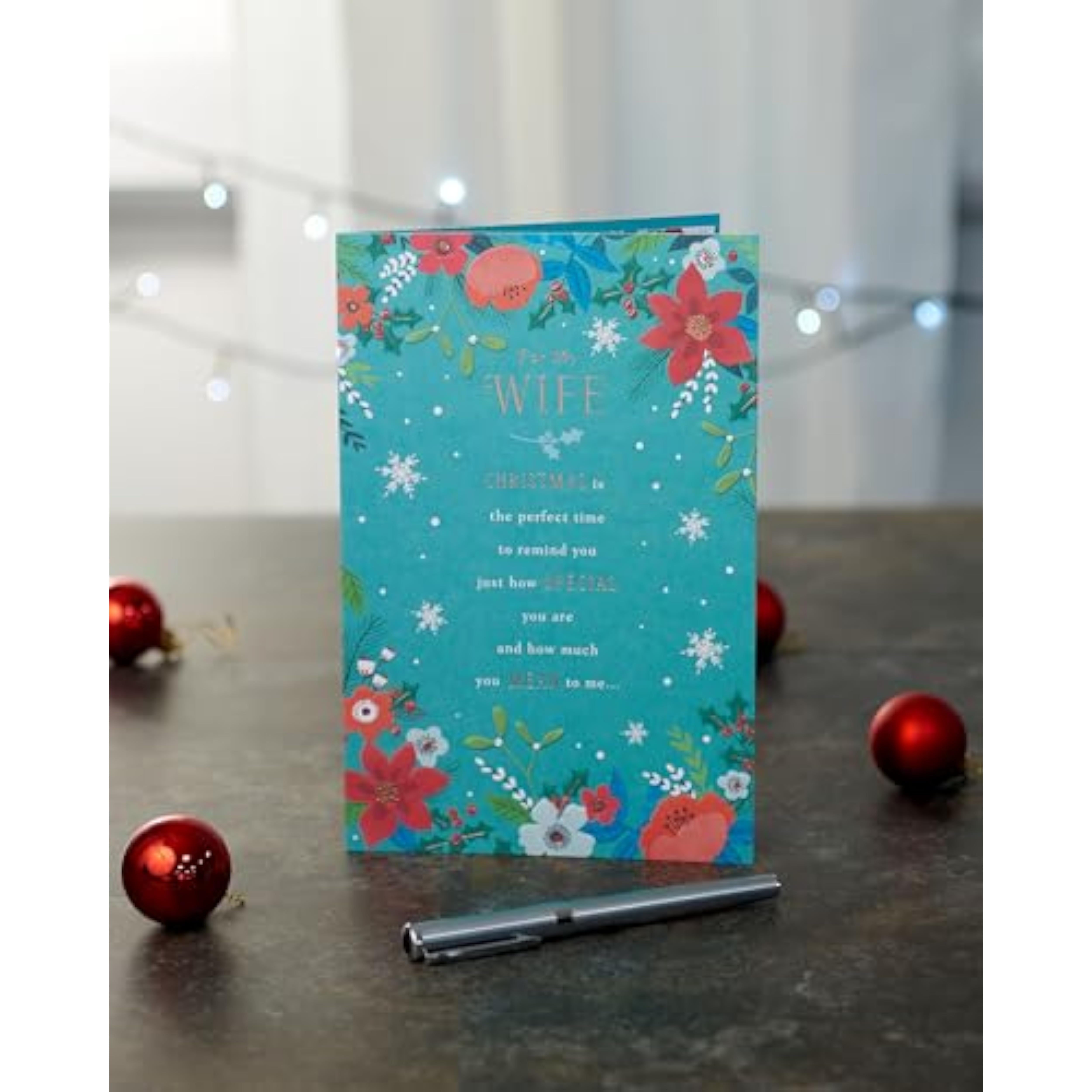 Elegant Christmas greeting card for wife with heartfelt foil heart design, featuring festive holiday imagery and UKG branding.
