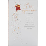 UKG Grandson Christmas greeting card with snowflakes and present festive design, featuring colorful holiday illustrations.