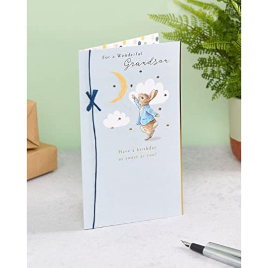 Peter Rabbit birthday greeting card for grandson with a blue bow, featuring charming illustrations, by UKG.