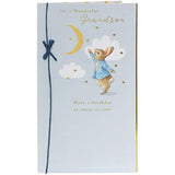 Peter Rabbit birthday greeting card for grandson with blue bow, featuring charming illustration and UKG branding.
