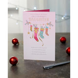 Pink Christmas greeting card for daughter featuring stockings and holiday design by UKG, perfect for warm holiday wishes.