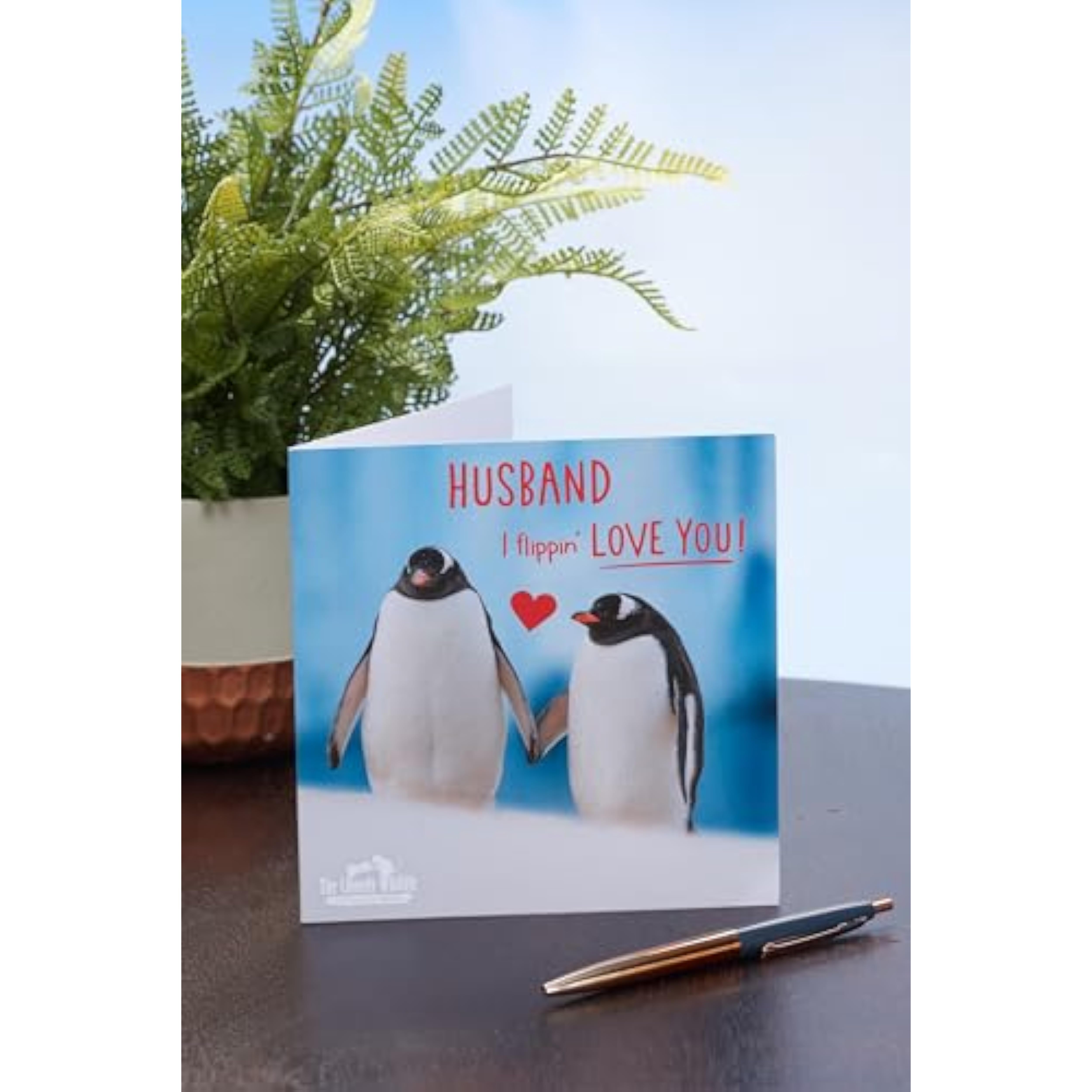 Cute Valentine’s Day greeting card for husband featuring a adorable penguin design by UKG.
