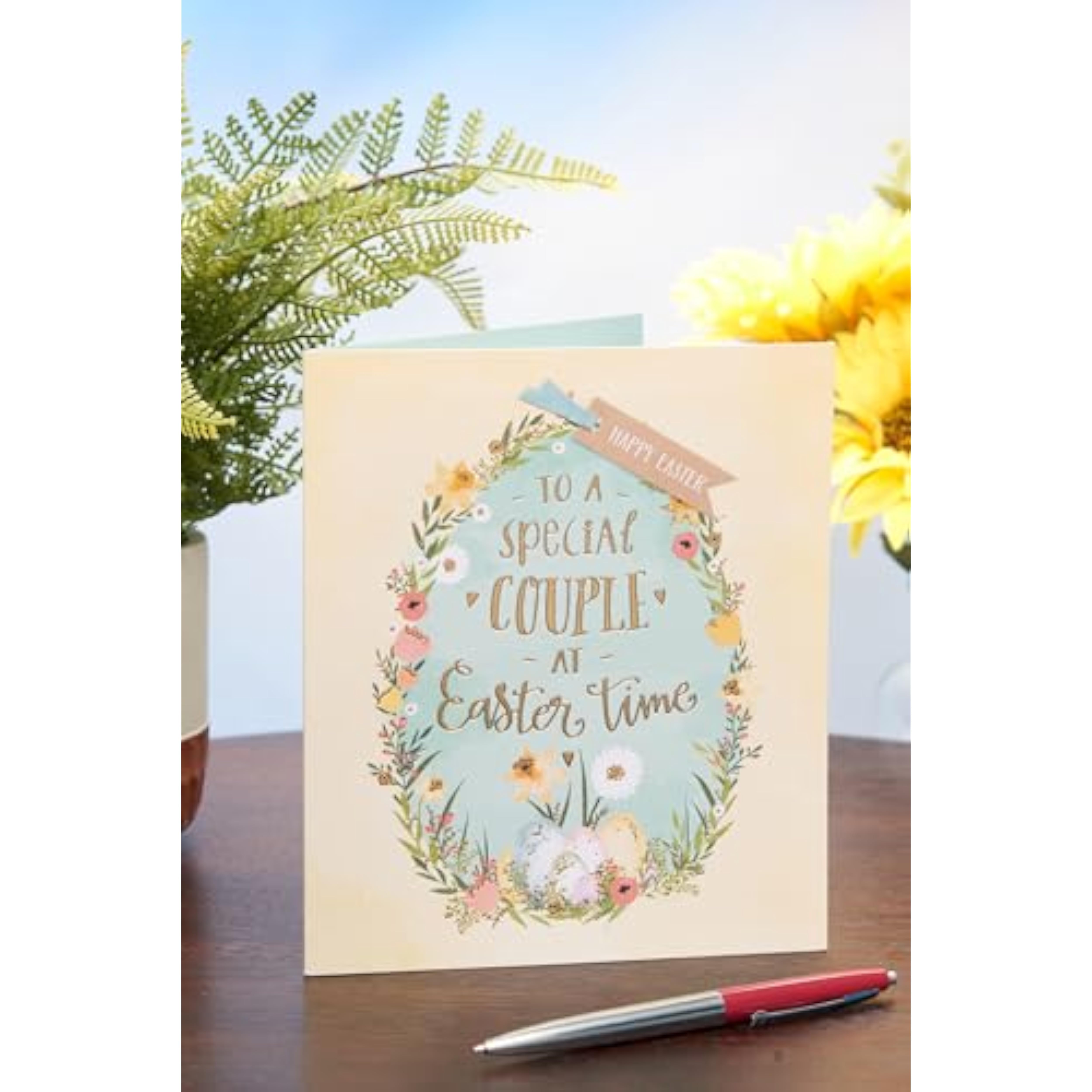 UKG Easter greeting card for couples featuring floral eggs and elegant design, perfect for celebrating special occasions.