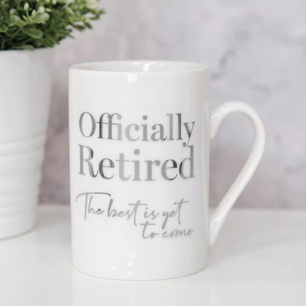 Widdop & Co Milestones Ceramic 11oz Mug featuring a retired design, with colorful milestone illustrations on a white background.