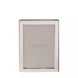 Silver plated 5x7-inch photo frame with flat edge design by Widdop & Co, showcasing a sleek, modern style for displaying photographs.