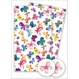 Two sheets of butterfly-themed gift wrap and matching tags from Abacus Cards greeting card set.