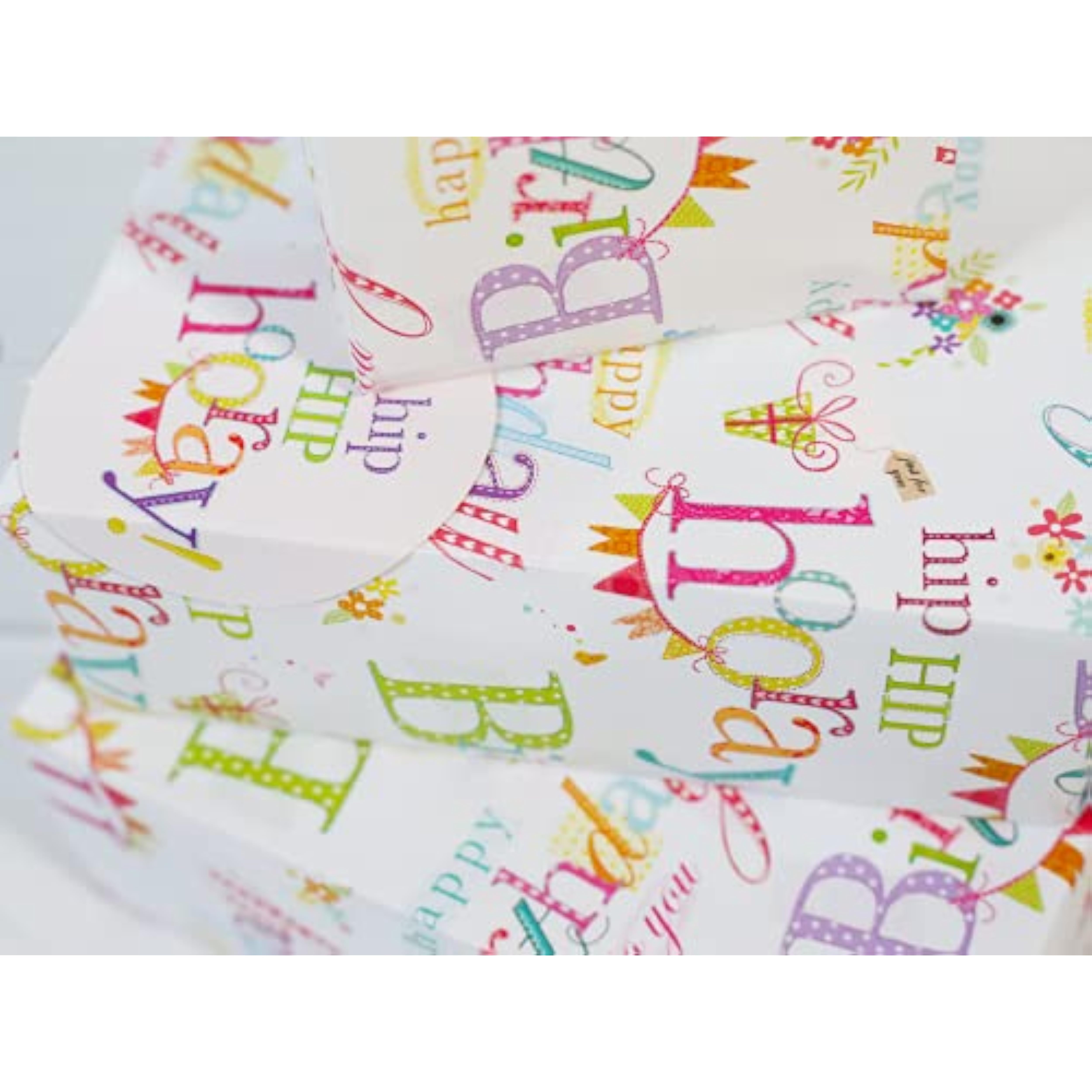 Happy Birthday greeting card with colorful text gift wrap and matching tags, by Abacus Cards.