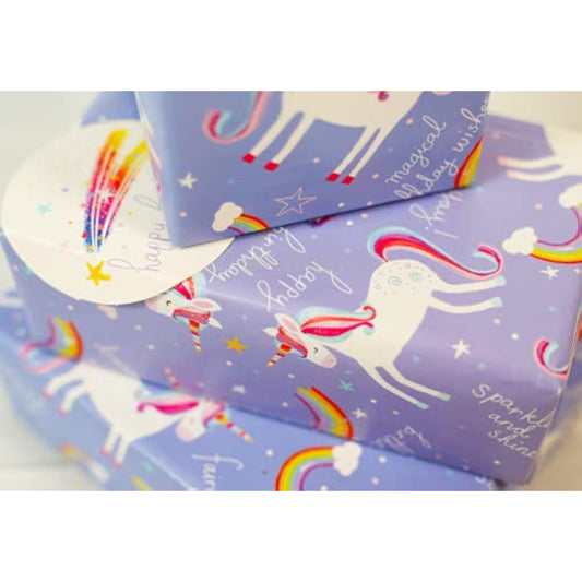 Unicorn-themed gift wrap with two sheets and two tags, featuring colorful unicorn illustrations on greeting card paper.