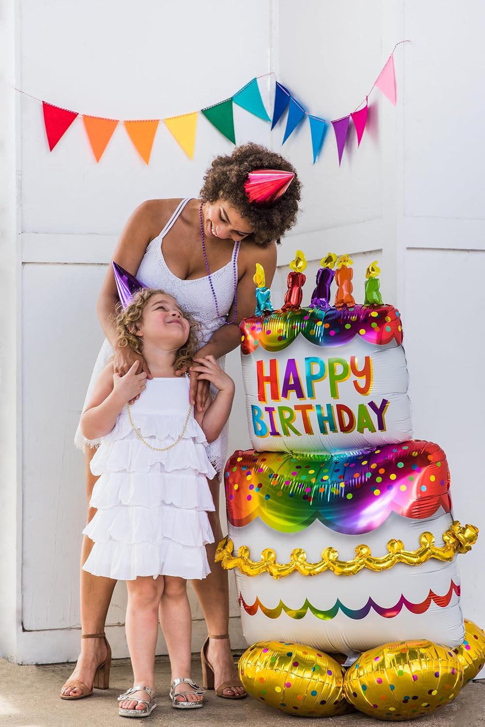 Gold foil birthday cake balloon by Anagram with colorful cake and candle design, perfect for birthday celebrations.
