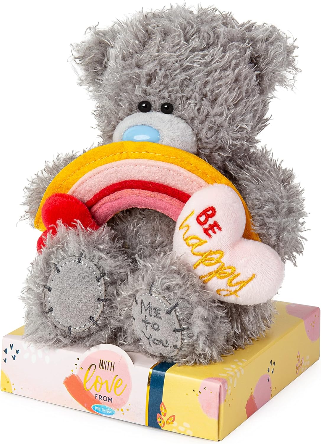Colorful rainbow plush toy from the M7 Be Happy collection by Carte Blanche, soft and cuddly with vibrant rainbow stripes.