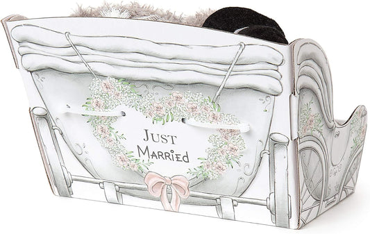 Bride and groom cake topper featuring S4 X 2 design by Carte Blanche, with detailed wedding attire and joyful expressions.
