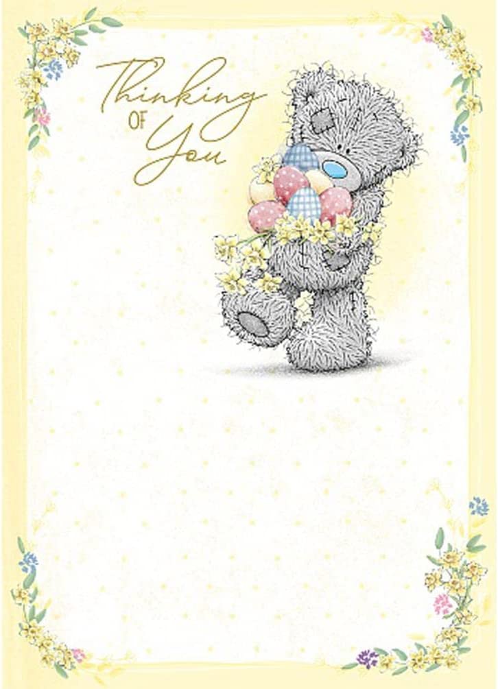 Carte Blanche plush Thinking Of You Bear holding a bundle of colorful Easter eggs, soft and cuddly for festive gifting.