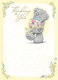 Carte Blanche plush Thinking Of You Bear holding a bundle of colorful Easter eggs, soft and cuddly for festive gifting.