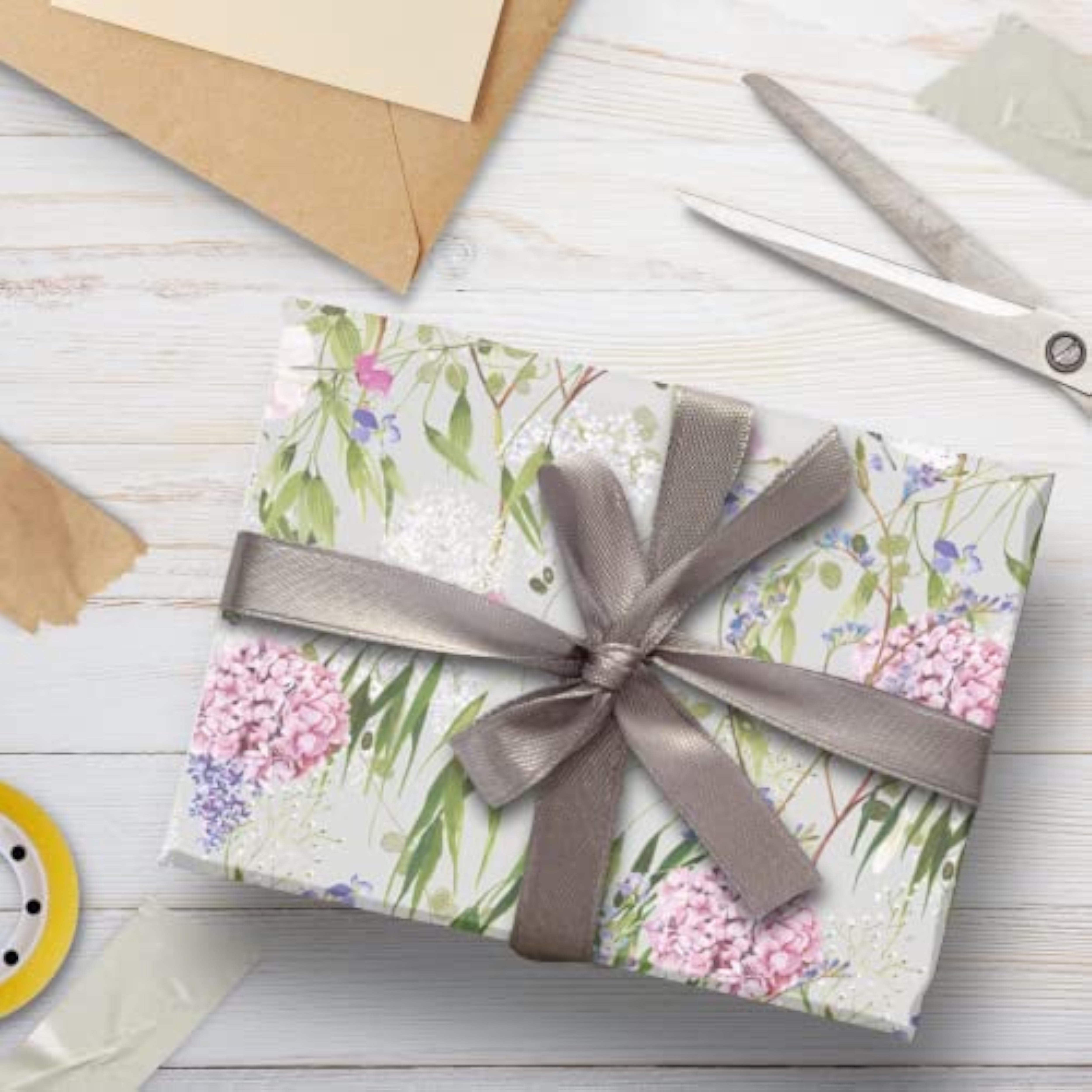 GLK Glick four sheets of cabbage white tissue paper, 750mm x 500mm, for gift wrapping and birthday decorations.