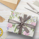 GLK Glick four sheets of cabbage white tissue paper, 750mm x 500mm, for gift wrapping and birthday decorations.