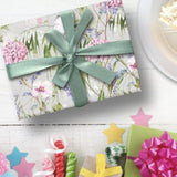 Four sheets of GLK cabbage white tissue paper, 750mm x 500mm, ideal for gift wrapping and craft projects.