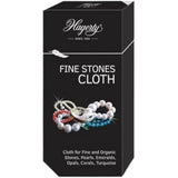 Hagerty Fine Stones BL jewelry cleaning cloth restoring shine to silver and fine jewelry, soft fabric with brand label visible