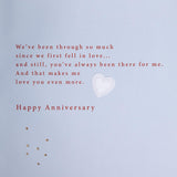 Hallmark anniversary card for husband featuring classic illustrated design and heartfelt verse, with a romantic heart motif.