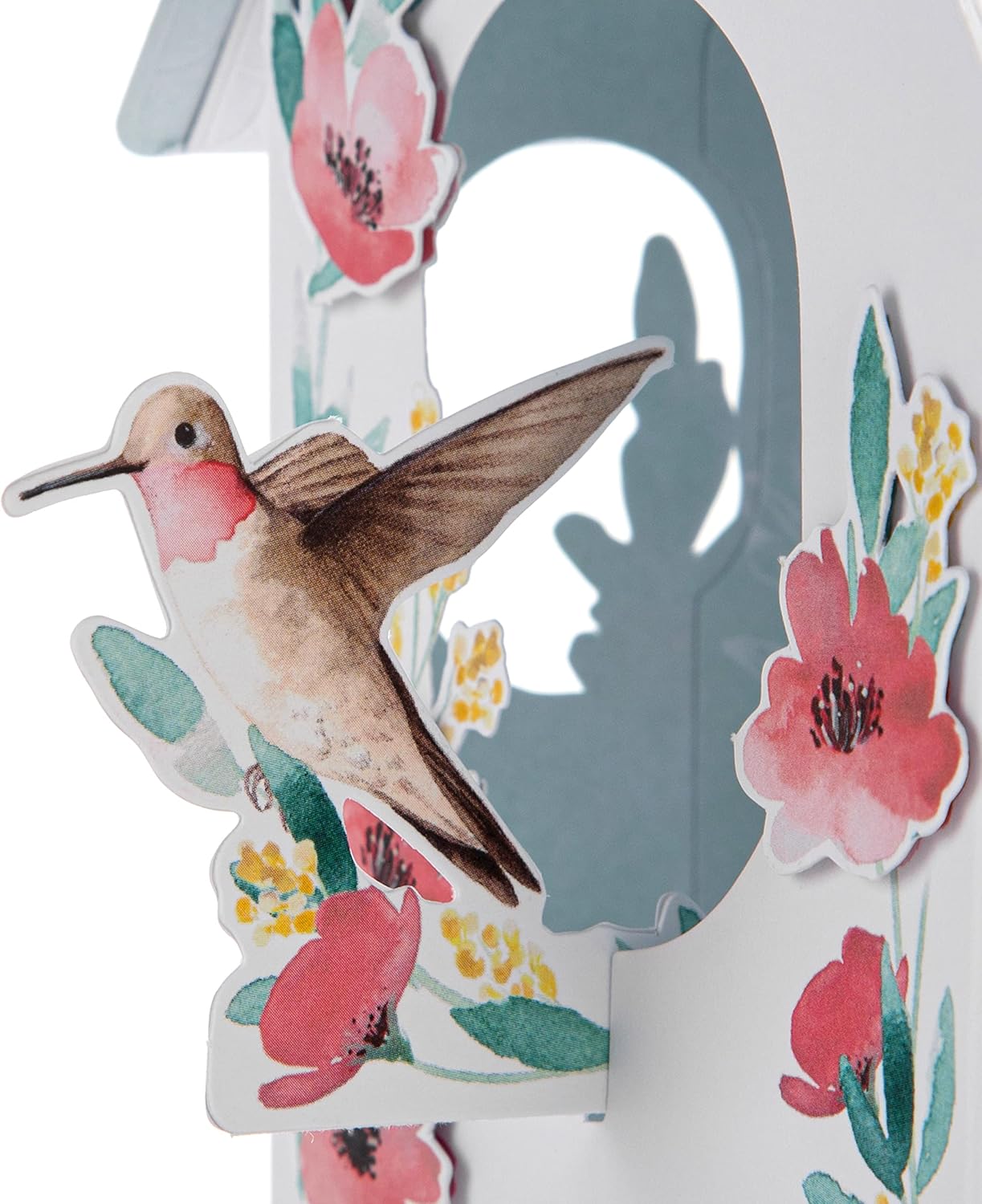 Hallmark modern 3D birdhouse Mother’s Day card featuring a stylish pop-up design with colorful bird and floral details.