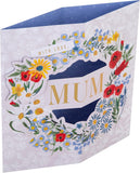 Hallmark pop-up 3D flower wreath Mother’s Day card featuring vibrant, elegant floral design and heartfelt greeting.