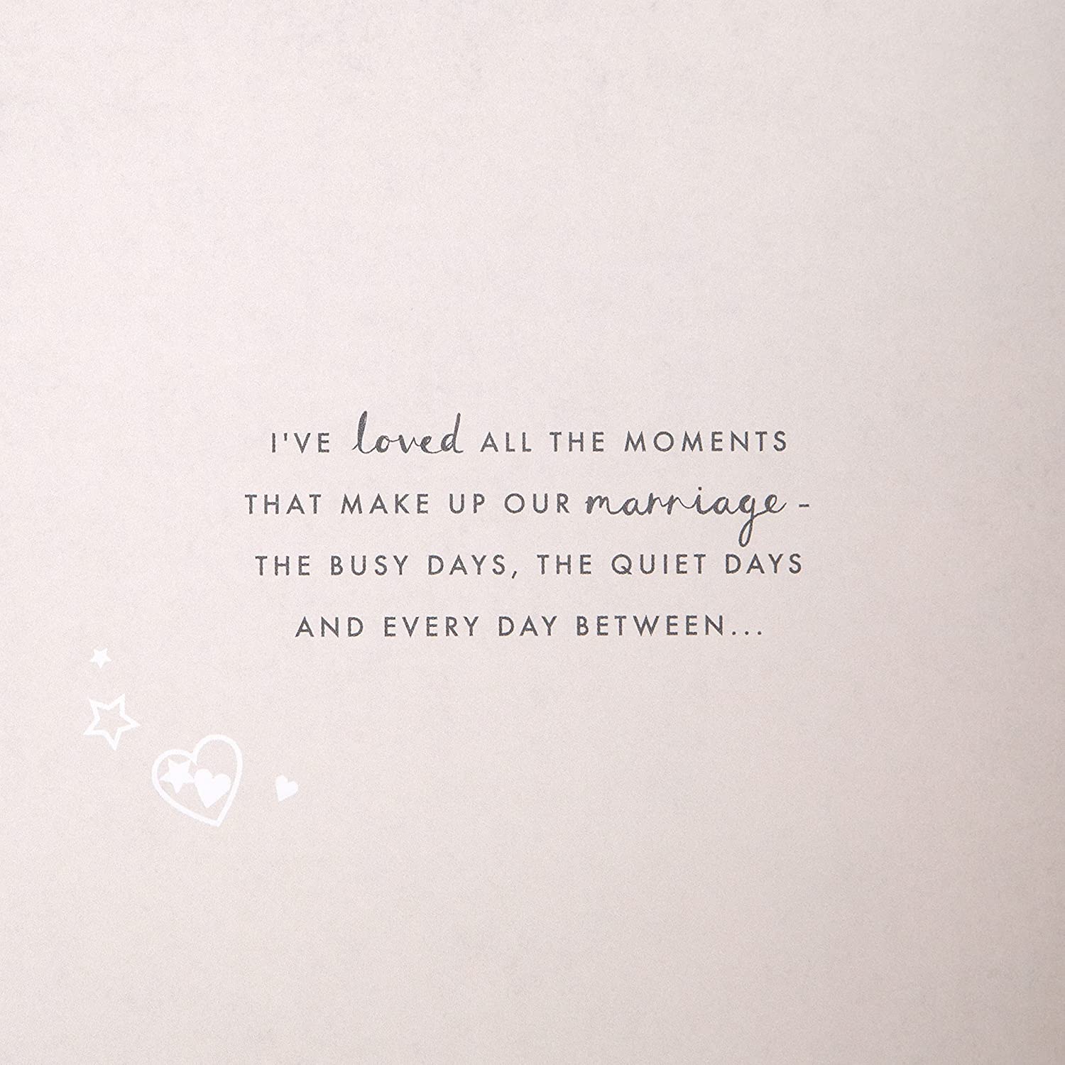 Laser-cut gold Hallmark anniversary greeting card featuring intricate designs for celebrating a husband's special day.