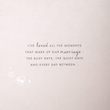 Laser-cut gold Hallmark anniversary greeting card featuring intricate designs for celebrating a husband's special day.