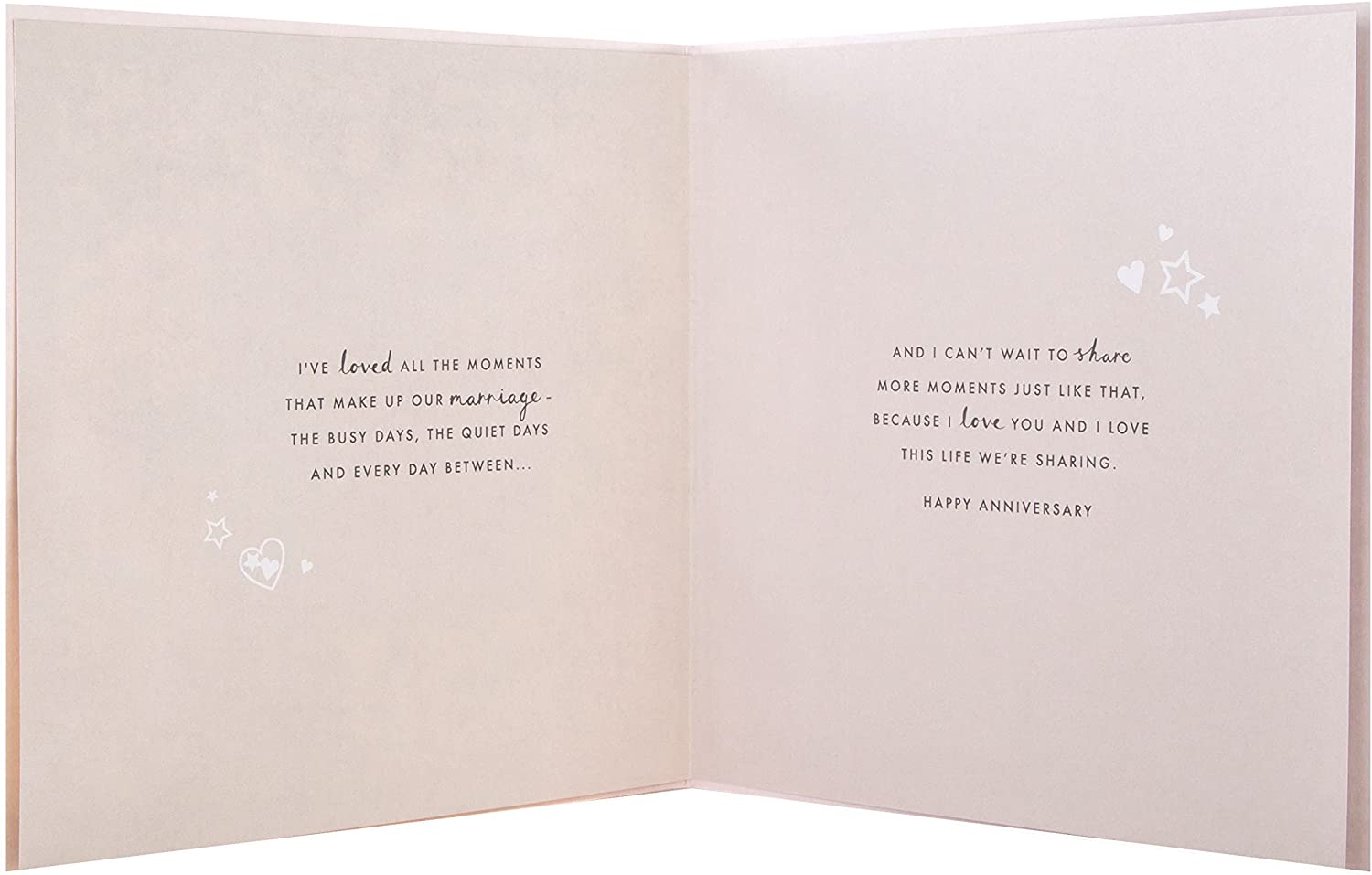 Gold laser-cut Hallmark anniversary greeting card featuring intricate heart designs for husbands.