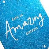 Hallmark textured blue foil birthday greeting card with bold impact design, featuring vibrant colors and festive embellishments.