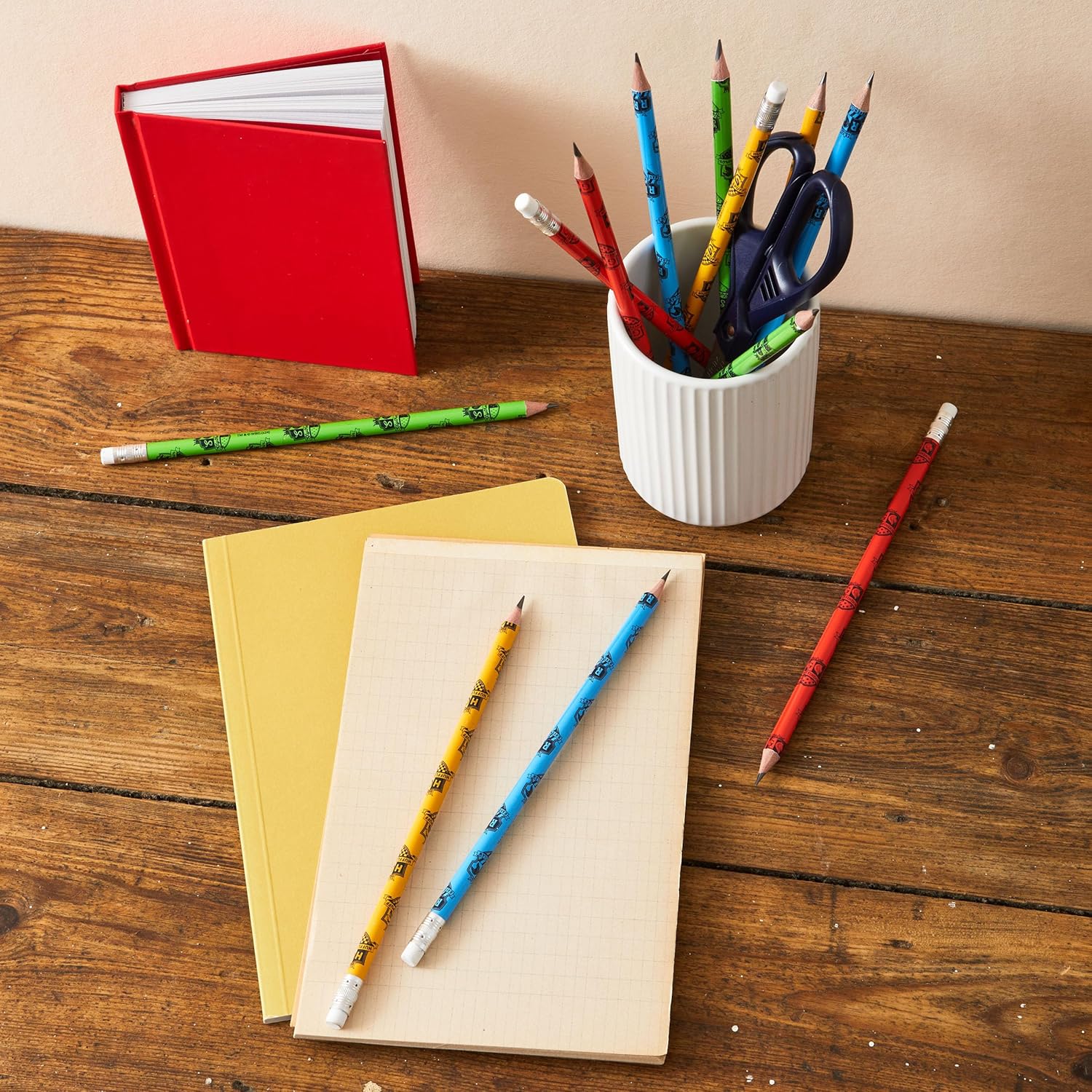Helix Harry Potter stationery set with notebooks, pens, and accessories featuring Hogwarts and wizard-themed designs.