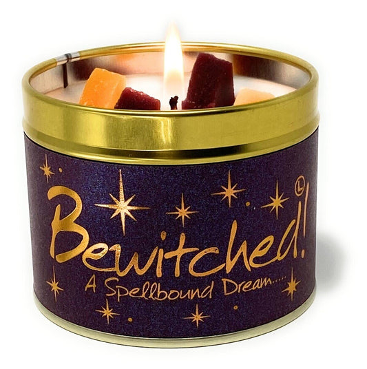 Lily-Flame Bewitched scented tin candle with mystical purple and black design, featuring a witch and moon illustration.